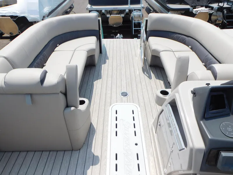 Slide: The Image of 2023 Silver Wave 2410 SW5 JS pontoon boat interior with plush seating. - 7