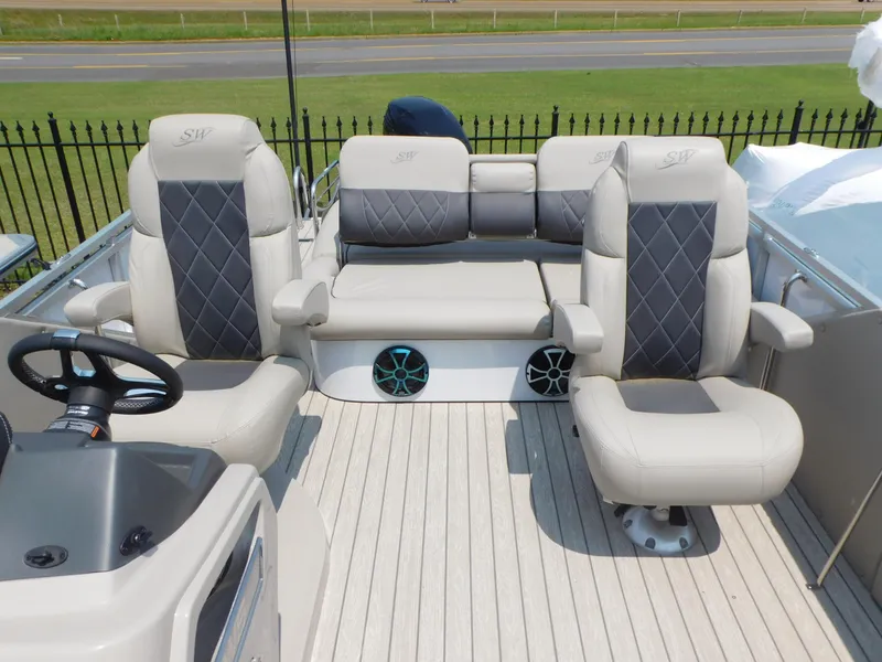Slide: The Image of 2023 Silver Wave 2410 SW5 JS boat interior with plush seating and modern design. - 8