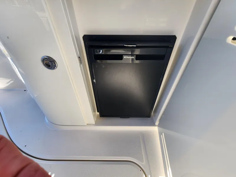 Slide: The Image of Built-in fridge on 2012 Sea Ray 350 Sundancer boat. - 10