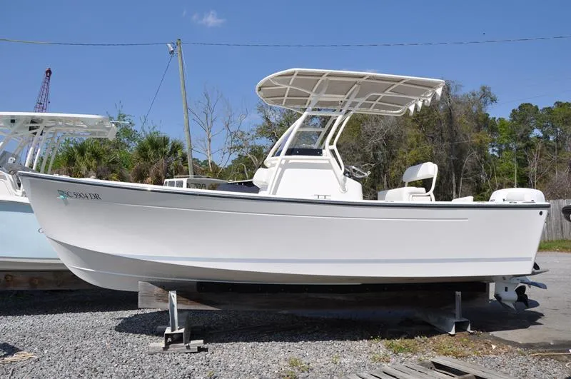 The Image of 2021 Century Coronado boat on dry dock, side view. - 1
