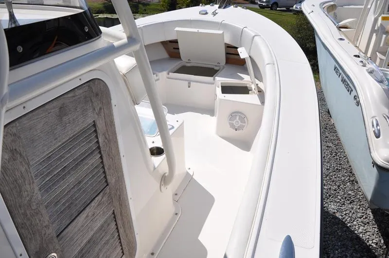 Slide: The Image of 2021 Century Coronado boat interior with open storage compartments. - 21