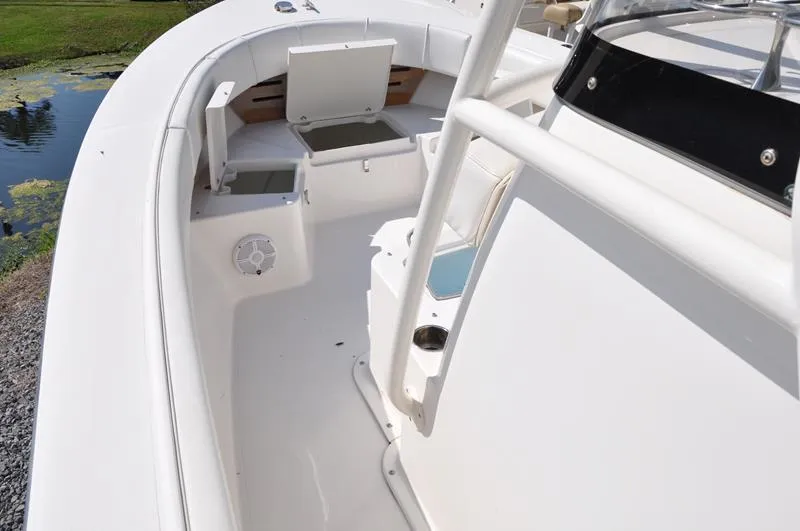 Slide: The Image of 2021 Century Coronado boat interior with open storage compartments and seating. - 22