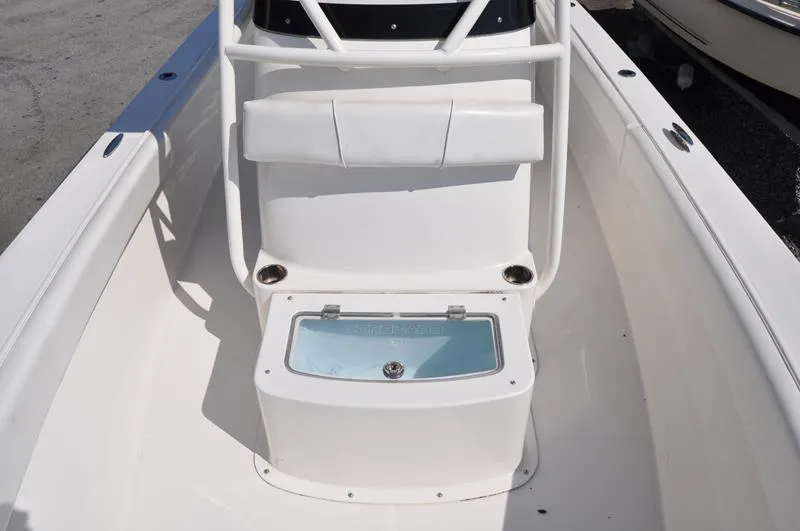 Slide: The Image of 2021 Century Coronado boat interior with seating and storage compartment. - 25
