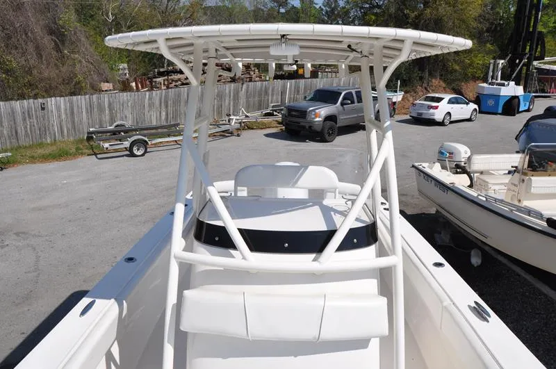 Slide: The Image of 2021 Century Coronado boat with T-top in a parking lot. - 26