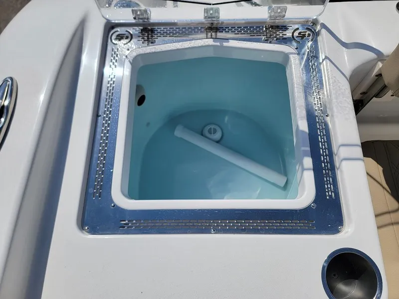 Slide: The Image of 2025 Sea Pro 322 DLX livewell with open lid. - 11