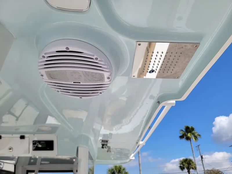Slide: The Image of 2025 Sea Pro 322 DLX boat interior ceiling with speaker and ventilation. - 29