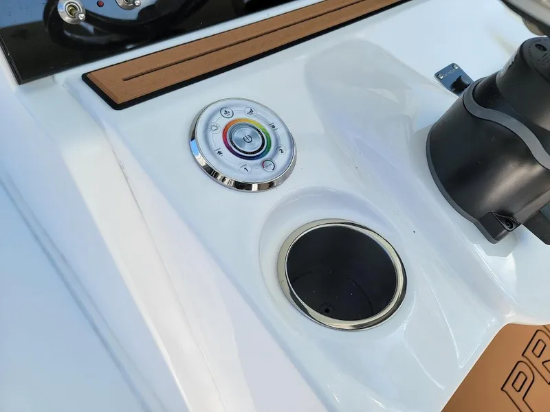 Slide: The Image of Close-up of the 2025 Sea Pro 322 DLX boat control panel. - 34