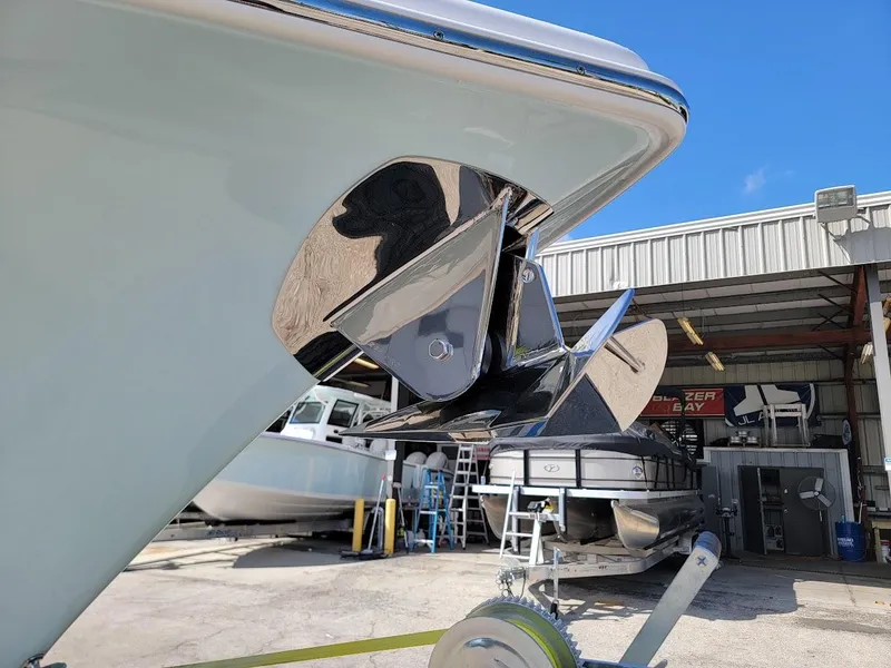 Slide: The Image of 2025 Sea Pro 322 DLX boat anchor detail at a marina. - 6