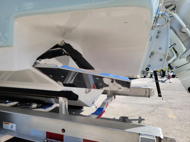 Slide: The Image of 2025 Sea Pro 322 DLX boat on trailer, rear view. - 7