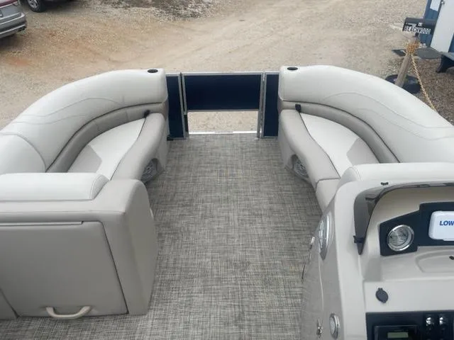 Slide: The Image of 2023 Cypress Cay Seabreeze 212 pontoon boat interior with beige seating. - 12