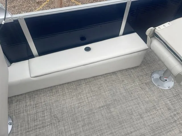 Slide: The Image of 2023 Cypress Cay Seabreeze 212 boat interior seating and flooring. - 8