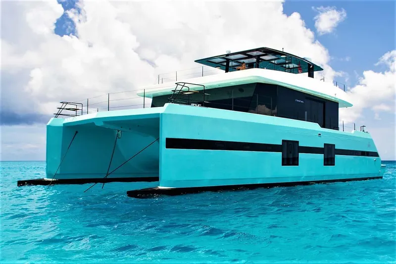 The Image of 2018 Sunreef 68 Supreme yacht on turquoise ocean under blue sky. - 0
