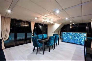 Slide: The Image of Luxurious interior of 2018 Sunreef 68 Supreme yacht with elegant dining area and modern decor. - 18