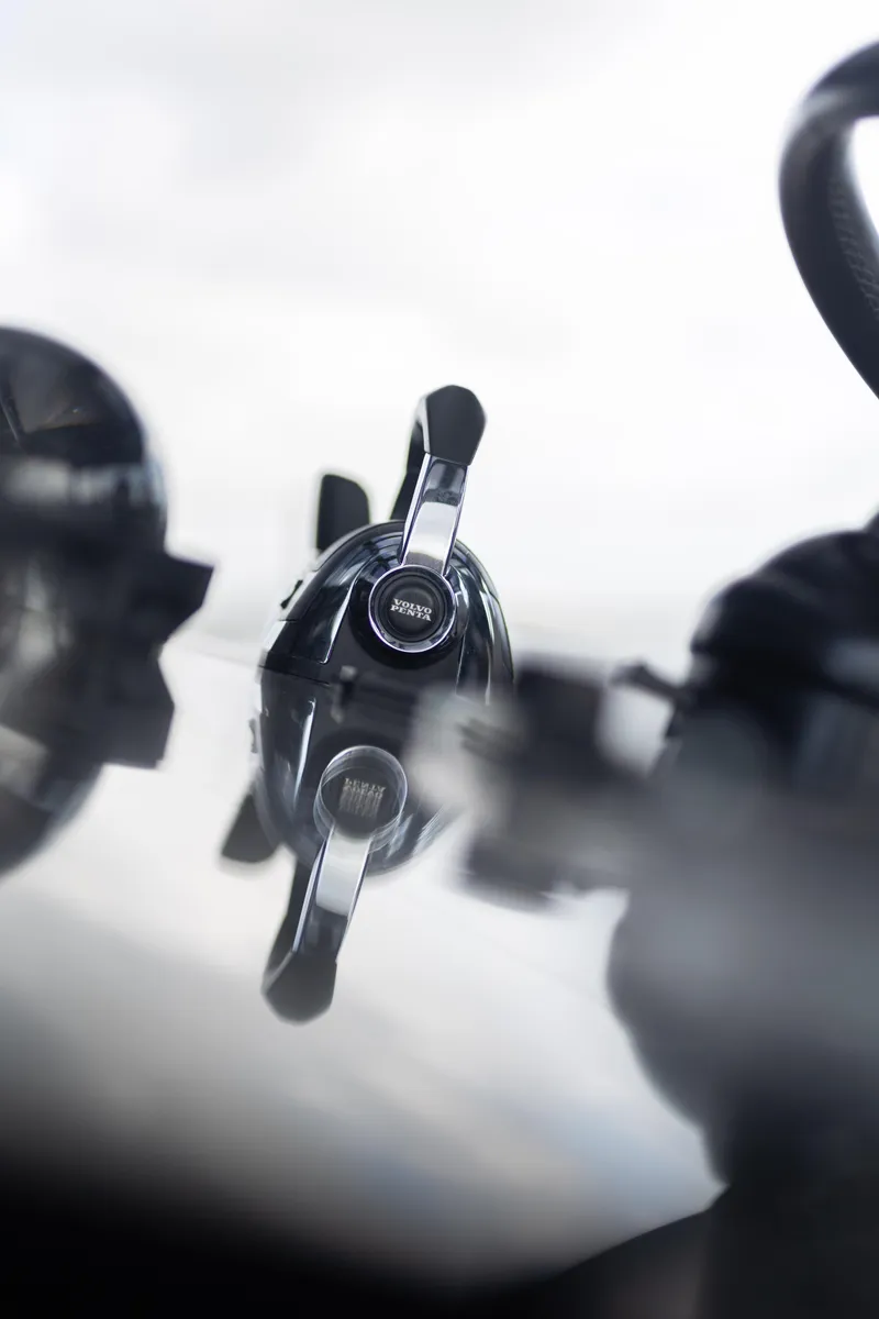 Slide: The Image of Close-up of Sunreef 68 Supreme 2018 yacht throttle control, reflecting on a glossy surface. - 26