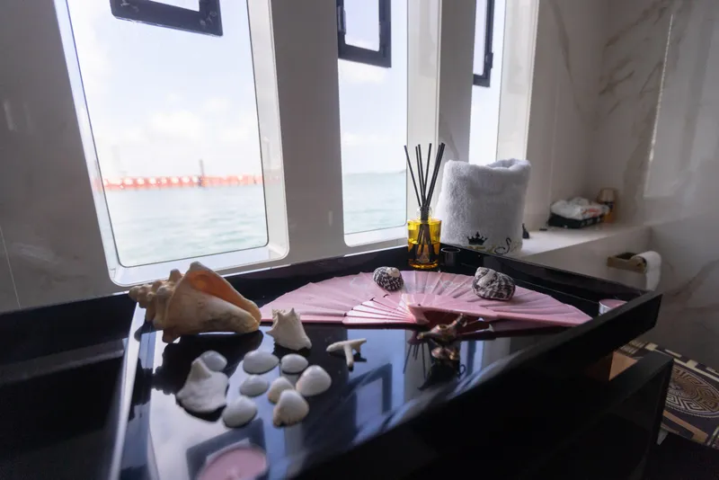 Slide: The Image of Luxurious Sunreef 68 Supreme 2018 yacht interior with seashell decor and ocean view. - 41