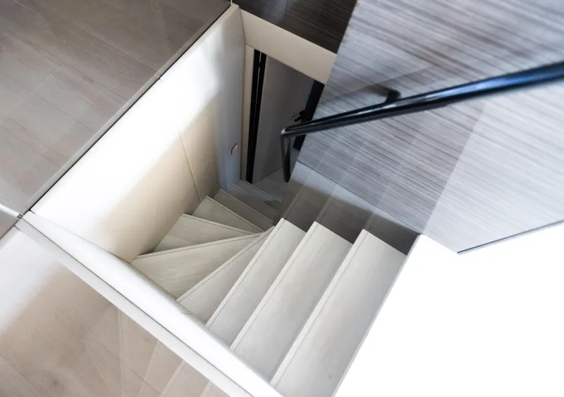 Slide: The Image of Staircase inside 2018 Sunreef 68 Supreme yacht, featuring modern design and sleek materials. - 42