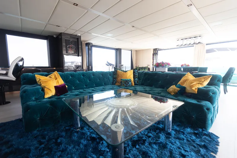 Slide: The Image of Luxurious interior of 2018 Sunreef 68 Supreme yacht with plush seating and vibrant decor. - 9
