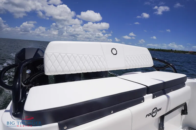 Slide: The Image of 2023 Fountain 38 TE boat with white seating on open water. - 22