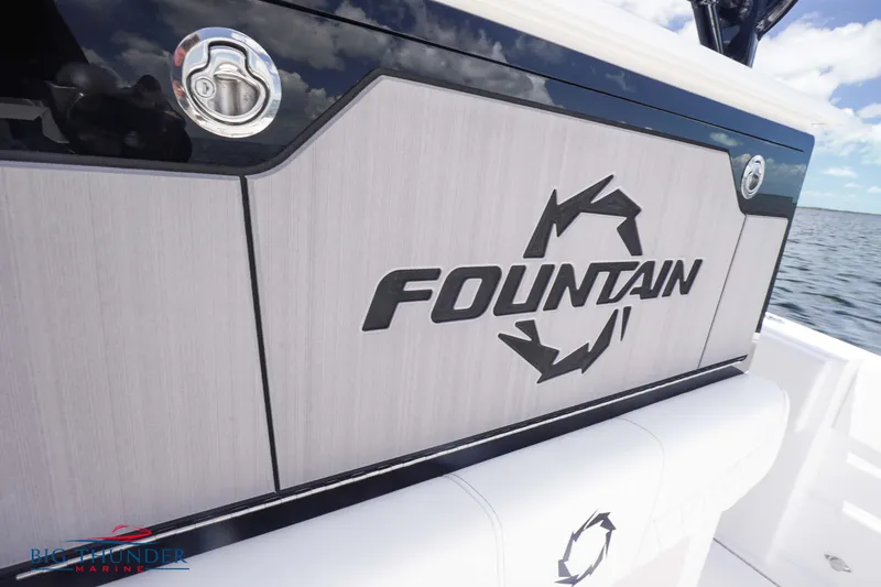 Slide: The Image of 2023 Fountain 38 TE boat logo on the side panel, ocean background. - 26
