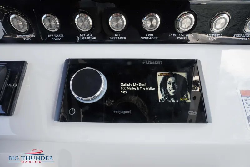 Slide: The Image of Fusion stereo system on a 2023 Fountain 38 TE boat, playing Bob Marley. - 35