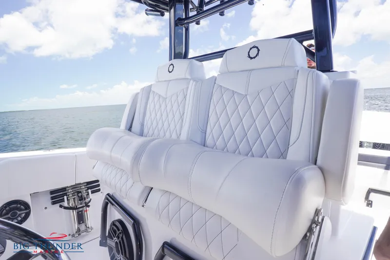 Slide: The Image of 2023 Fountain 38 TE boat with luxurious white leather seats and diamond stitching. - 37
