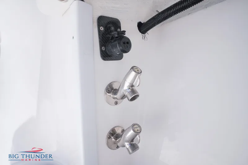Slide: The Image of 2023 Fountain 38 TE boat fittings and electrical outlet. - 38