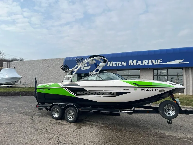 Slide: The Image of 2014 Moomba Mojo 2.5 boat on trailer outside Hern Marine dealership. - 8