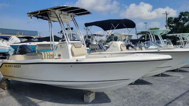 Slide: The Image of 2026 Key West 189 FS boat with Yamaha engine displayed outdoors. - 1