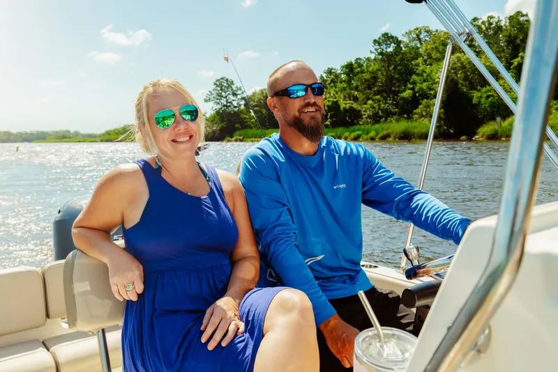 Slide: The Image of Anchor compartment of 2026 Key West 189 FS boat, open lid, sunny day. - 18