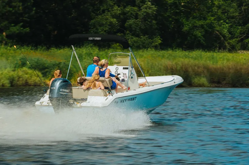 Slide: The Image of 2024 Key West 189 FS boat cruising on a sunny day with passengers. - 26