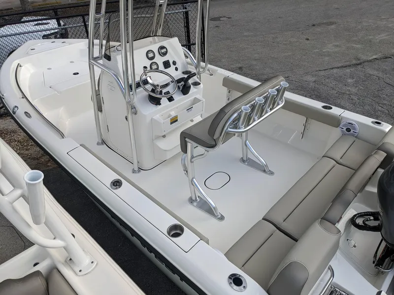 Slide: The Image of 2026 Key West 189 FS boat with Yamaha 115 engine, docked outdoors. - 4