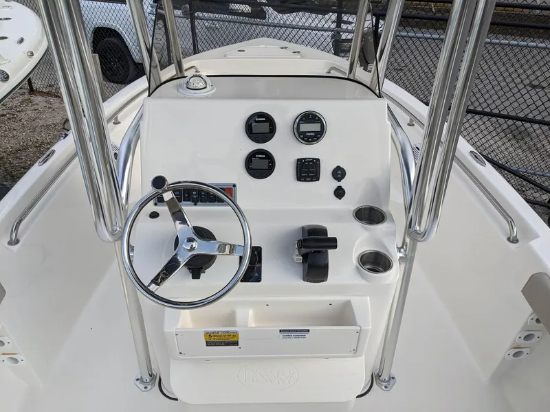 Slide: The Image of Key West 189 FS 2026 boat interior with open storage compartment. - 7