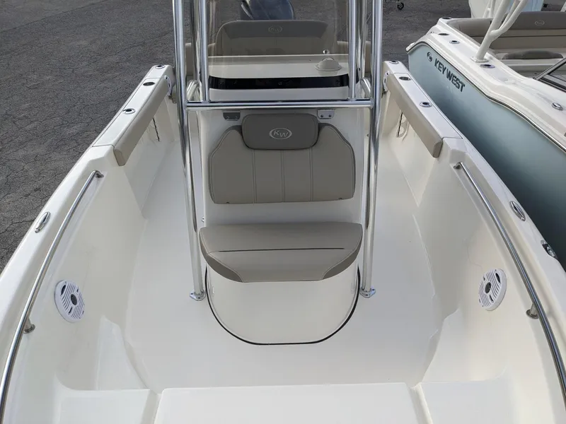 Slide: The Image of Interior view of a 2026 Key West 189 FS boat, showcasing seating and storage features. - 8