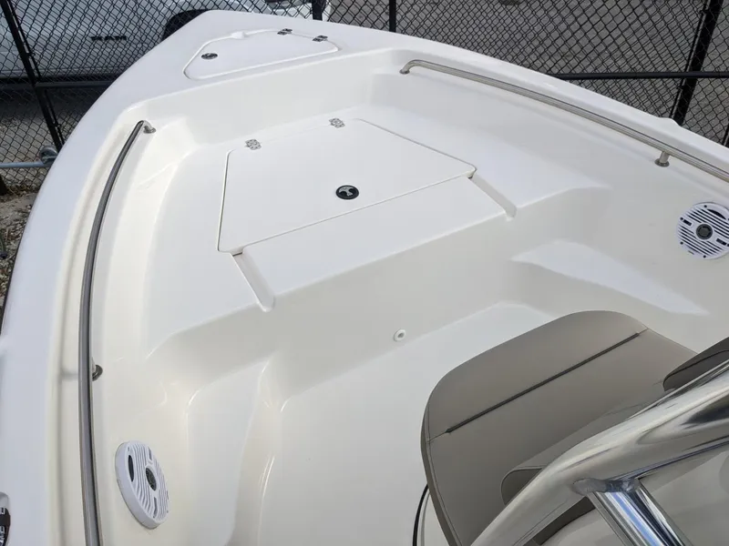 Slide: The Image of 2026 Key West 189 FS boat interior detail with rod holders and seating. - 9