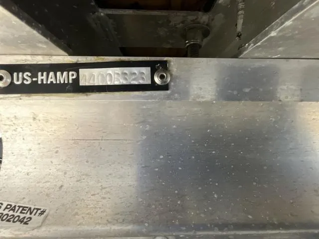 Slide: The Image of 2023 Harris Cruiser 230 boat identification plate with serial number. - 13