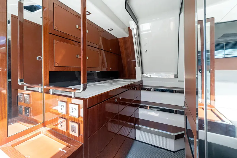 Slide: The Image of Luxurious interior of 2022 Riva 38 Rivamare yacht with modern cabinetry and sleek design. - 27
