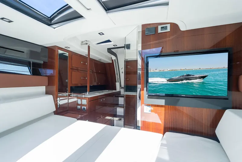 Slide: The Image of Interior of 2022 Riva 38 Rivamare yacht with modern design and large TV. - 29