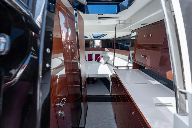 Slide: The Image of Interior of 2022 Riva 38 Rivamare yacht with modern kitchen and seating area. - 30
