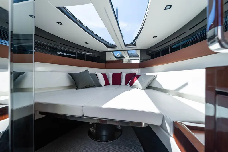 Slide: The Image of Luxurious interior of 2022 Riva 38 Rivamare yacht with modern seating and skylight. - 31