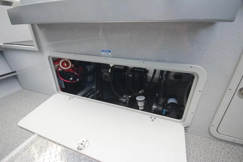 Slide: The Image of 2023 Weldcraft 210 Revolution F200XB Walleye Edition boat storage compartment. - 22