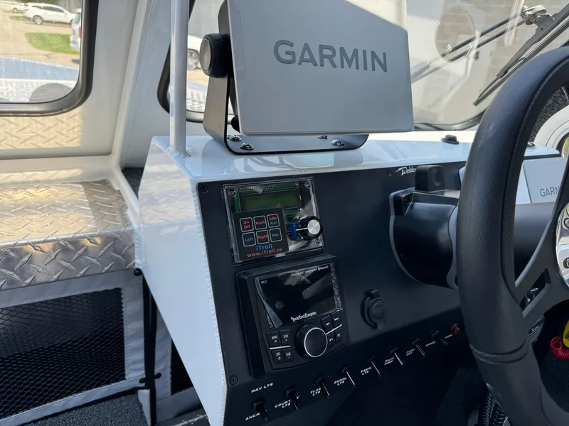 Slide: The Image of 2023 Weldcraft 210 Revolution F200XB Walleye Edition dashboard with Garmin navigation system. - 25