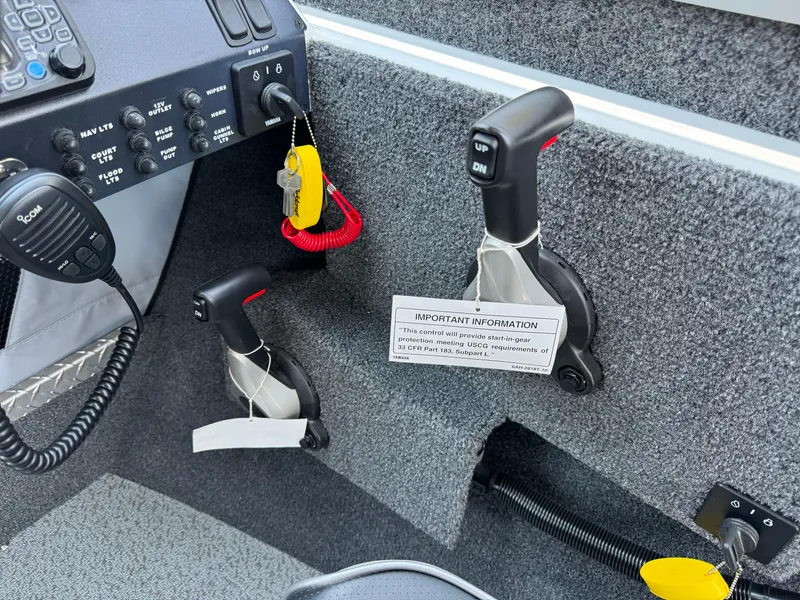 Slide: The Image of 2023 Weldcraft 210 Revolution F200XB Walleye Edition boat controls and dashboard. - 27