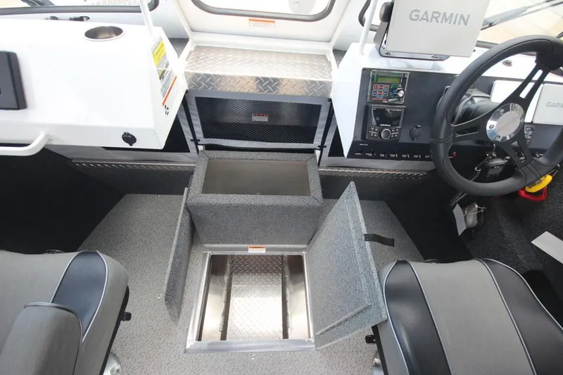 Slide: The Image of 2023 Weldcraft 210 Revolution F200XB Walleye Edition boat interior with Garmin navigation system. - 35