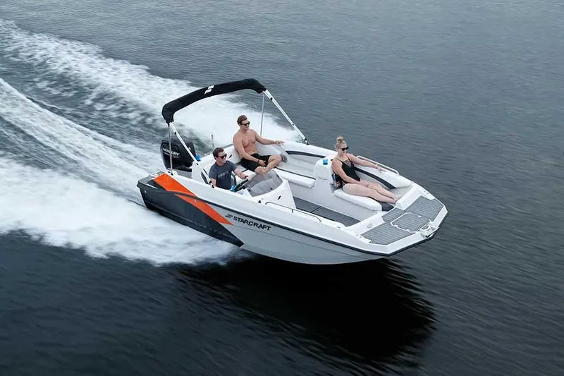 Slide: The Image of 2023 Starcraft 171 SVX boat cruising on water with passengers. - 10