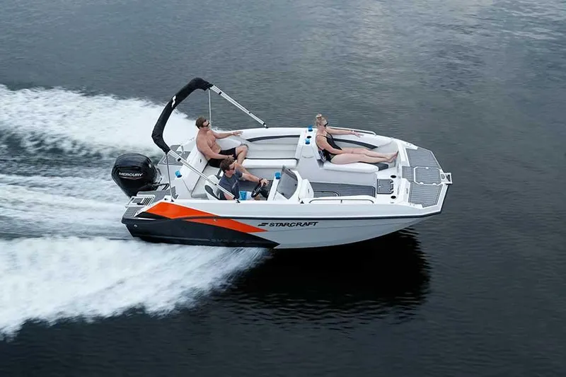 Slide: The Image of 2023 Starcraft 171 SVX boat cruising on water with passengers. - 11