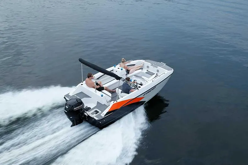 Slide: The Image of 2023 Starcraft 171 SVX boat cruising on water with passengers. - 12