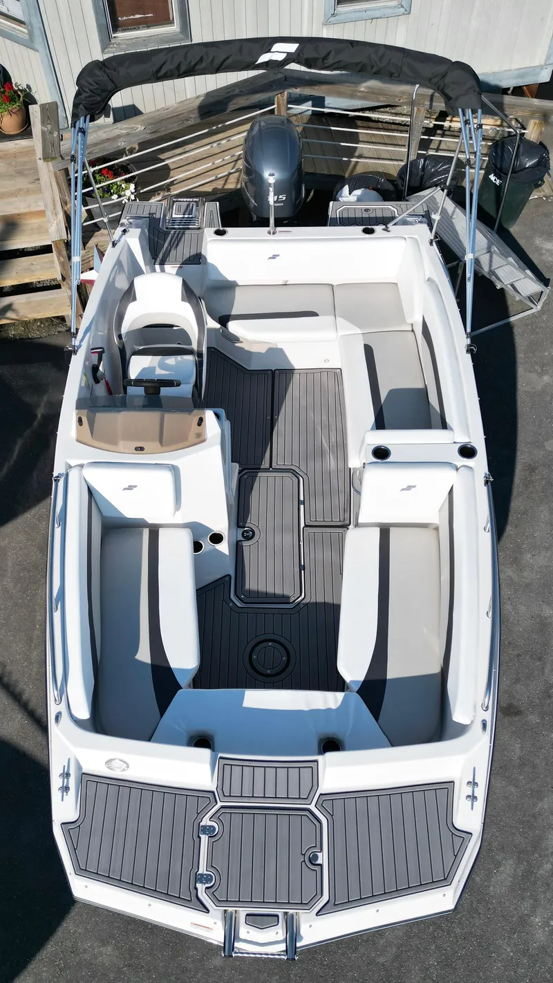 Slide: The Image of 2023 Starcraft 171 SVX boat with sleek interior design and modern seating arrangement. - 3