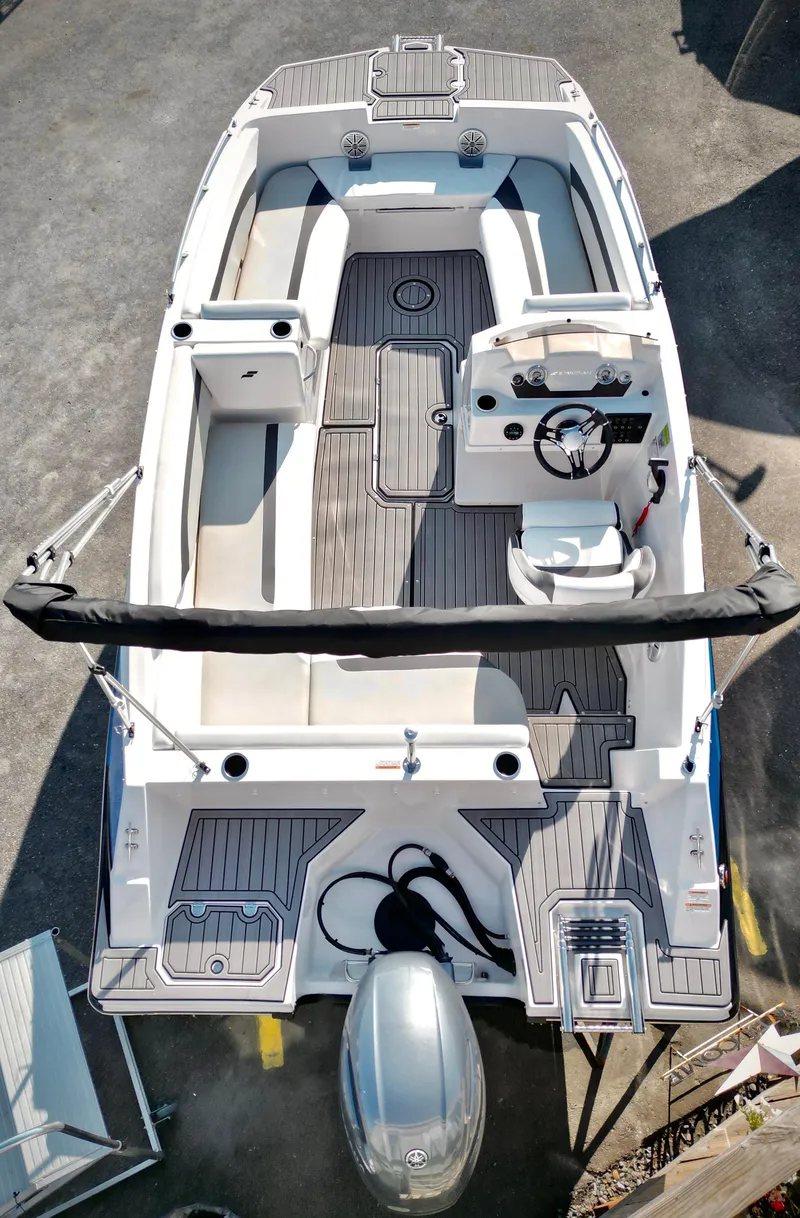 Slide: The Image of 2023 Starcraft 171 SVX boat, aerial view, showcasing sleek design and spacious interior. - 4