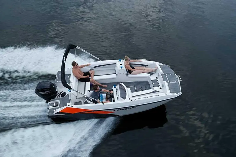 Slide: The Image of 2023 Starcraft 171 SVX boat cruising on water with passengers. - 8
