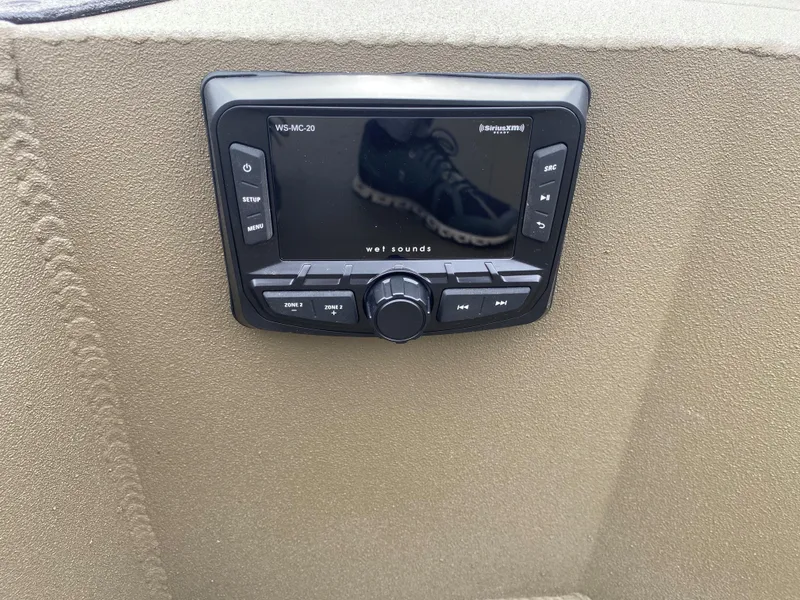 Slide: The Image of 2023 Thor Lake Hammer audio control panel with display and buttons. - 16